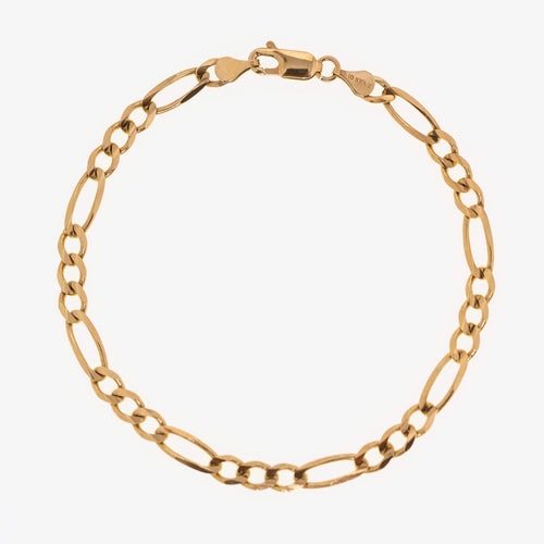 Gold Figaro bracelet featuring alternating pattern links, known for its timeless and sophisticated design-6
