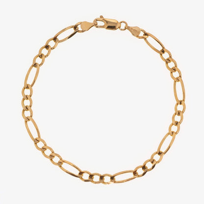 Gold Figaro bracelet featuring alternating pattern links, known for its timeless and sophisticated design-6
