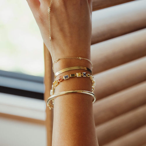 Gold herringbone bracelet with a 3.7mm width, featuring a sleek, flat design perfect for elegant and modern styling-1
