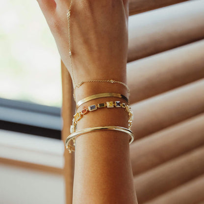 Gold herringbone bracelet with a 3.7mm width, featuring a sleek, flat design perfect for elegant and modern styling-1